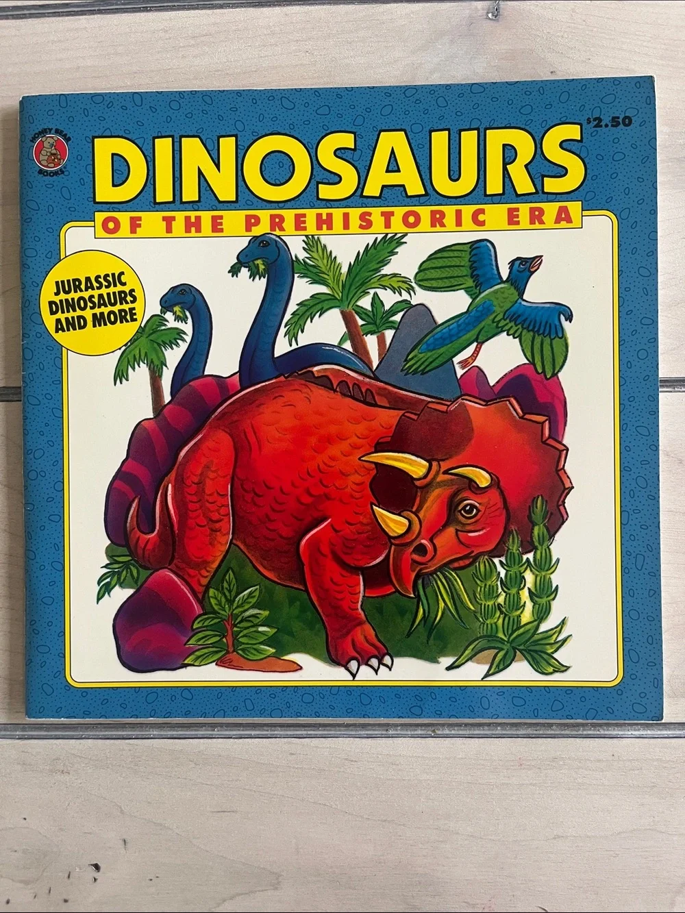Set of 4 Dinosaur themed books, fiction and non-fiction